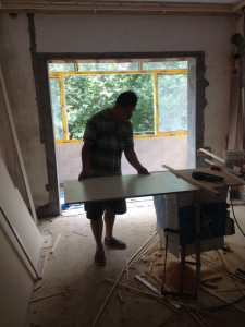 南京虎踞北路77平老房装修工地实拍木工工作台