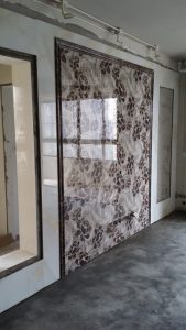 南京金地明悦140四室两厅瓦工装修工地直播电视背景墙