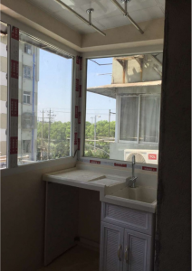 南京银城花园装修工地阳台洗衣柜