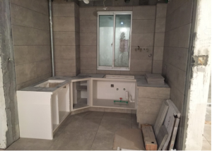 南京旭日上城84平厨房装修砖砌橱柜。